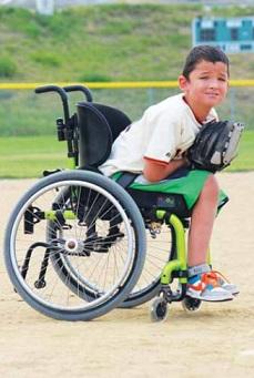 All Abilties sports with a child in a wheelchair