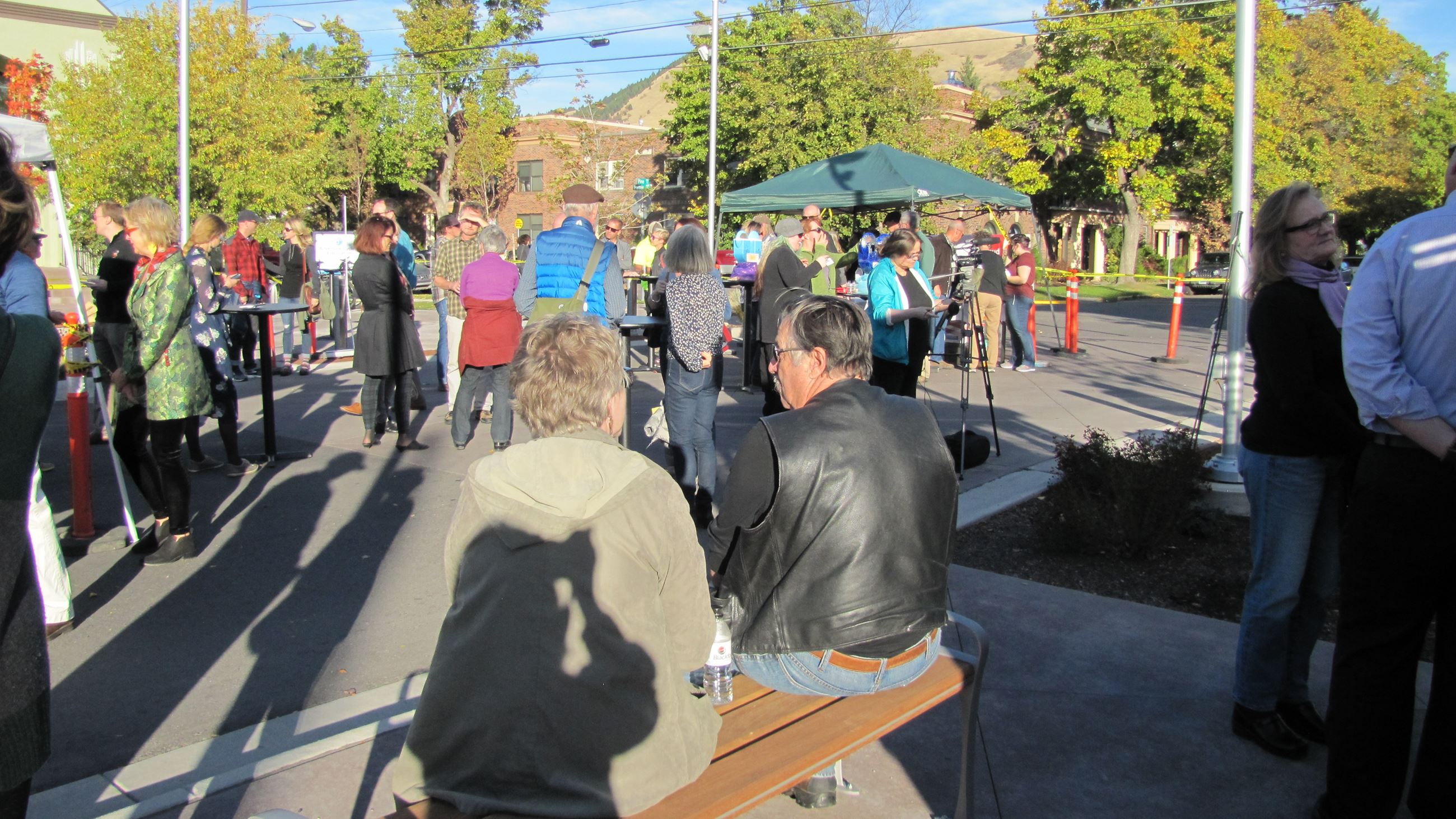 A group of people visiting after the event