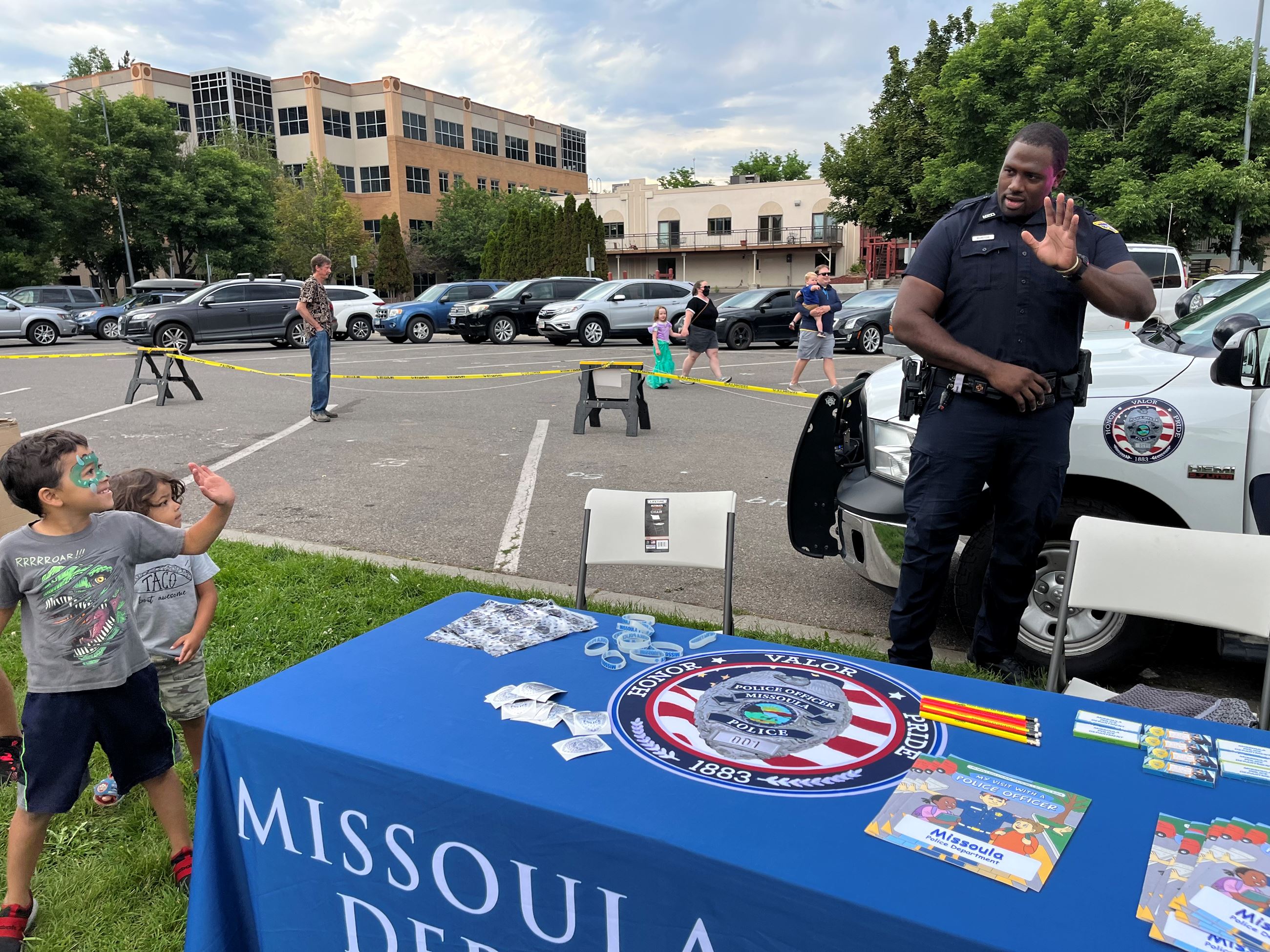 Officer Burton waving to kids 